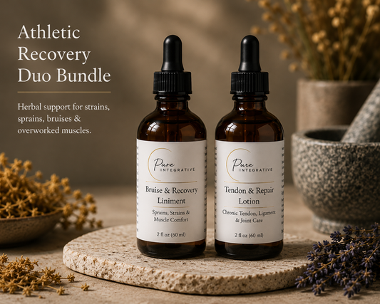 Pure Integrative Athletic Recovery Duo Bundle: Bruise & Recovery Liniment and Tendon & Repair Lotion in amber dropper bottles, staged on a stone slab with dried herbs and lavender