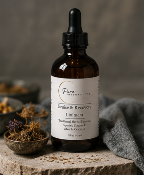 Pure Integrative Bruise & Recovery Liniment label detail showing ingredient list and traditional Chinese medicine herbal formula
